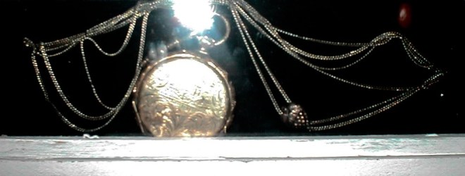 Katie Andrus' locket-has Rod's pic inside.jpg